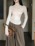 Ultra-Good-Looking High-Collared Bottom Shirt Women's Autumn And Winter Knitted Shirt Woolen Meat With Wide Leg Trousers Tops